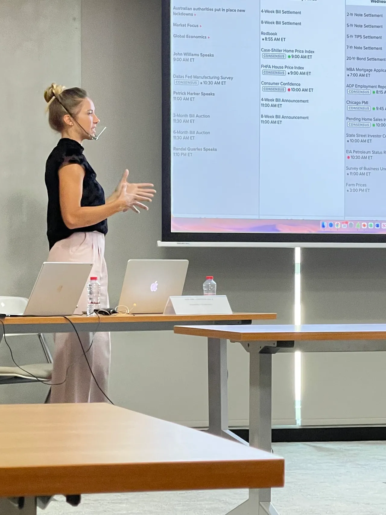 Kait teaching a live trading class in Dubai